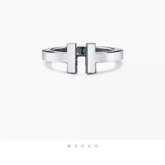 Tiffany & Co. Silver T Design Ring Sz 7
Via - Picture 2 of 10